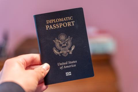 A person holding a diplomatic passport.