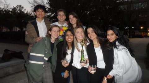 Members of the GT Mock Trial team posing with their winning trophy.