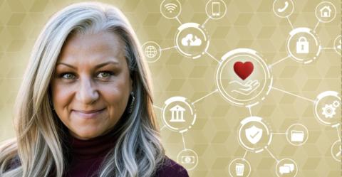 Woman in dark top against gold backdrop of white IT-related icons