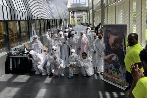 Students pose in bunny suits during Chips Camp.