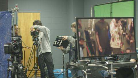 High school students filming a scene as part of the Cinemagination Film Camp