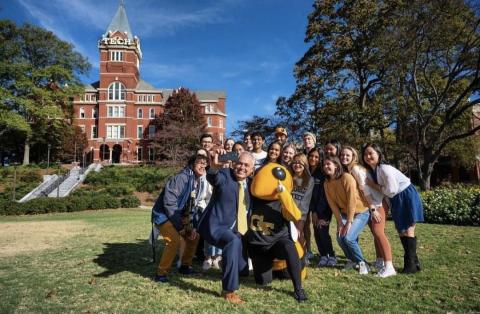 Image of President Cabrera and students