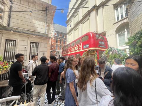 Photo of Oxford students mingling with GT Alumni.