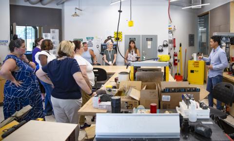 Teachers touring makers space at K12 InVenture Summer 2024 PD