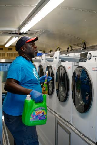 Nicky Crawford in Mobile Laundry Bus