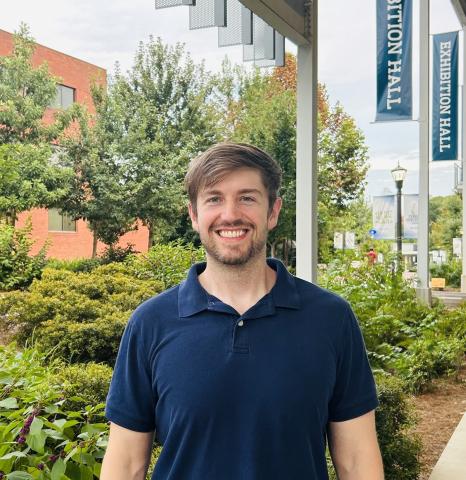 Headshot of a man standing on the Georgia Tech campus