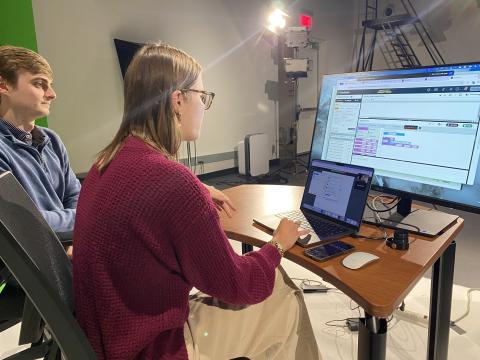 This image shows two of the Georgia Tech instructors in the program as they conduct a virtual class with students in Chattooga County