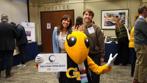 Buzz and students at the 2025 GCHC conference.