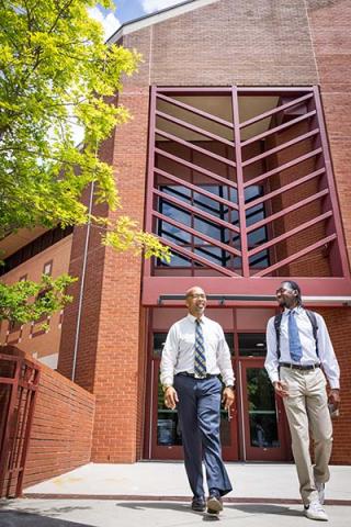 Father and son, Sababu and Tai'Re Barashango, share a bond through CS at Georgia Tech; Sababu as a Center for Education Fellow and Tai'Re as a graduating CS major. Photos by Kevin Beasley/ College of Computing.