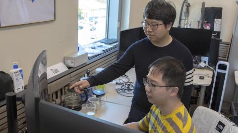 Tao Lu, a Ph.D. student at the School of Interactive Computing, with Assistant Professor Yalong Yang