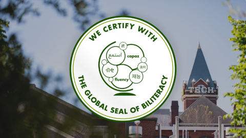 The Global Seal of Biliteracy logo over a photo of Tech Tower.