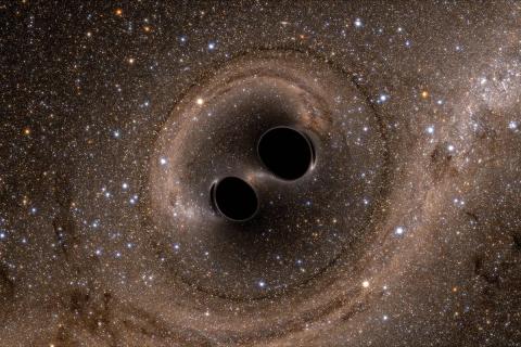 A computer simulation of a collision of two black holes. Image credit: LIGO Laboratory/Reuters