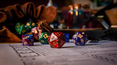 Colorful dice sit on a table