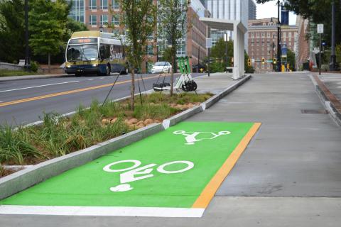 View of the newly installed cycle track looking east toward Tech Square.