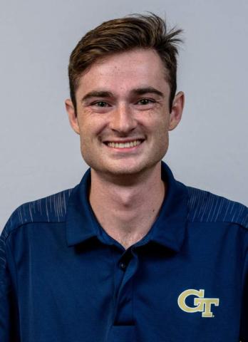 young man in blue shirt