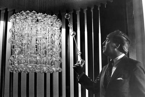 John Portman with chandelier 