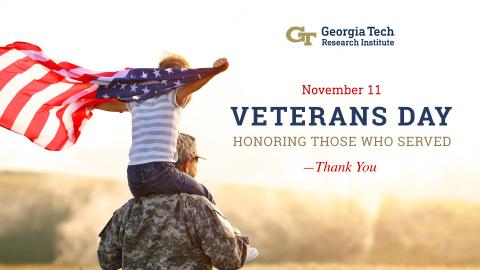 GTRI Veterans Day 2025 banner--child holding flag while sitting on soldier's shoulders.