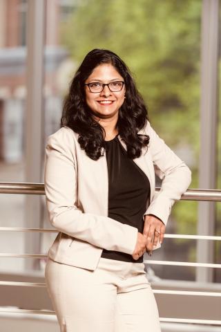 Women standing in front of railing