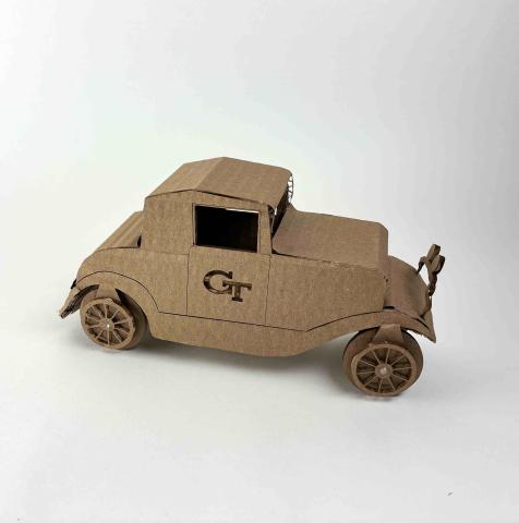 Cardboard model of GT's Ramblin' Wrek on a white background. 