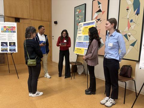 Image of students, faculty, and research faculty at a poster session for SDG Week 2025.