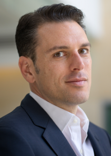 Professional headshot of a man