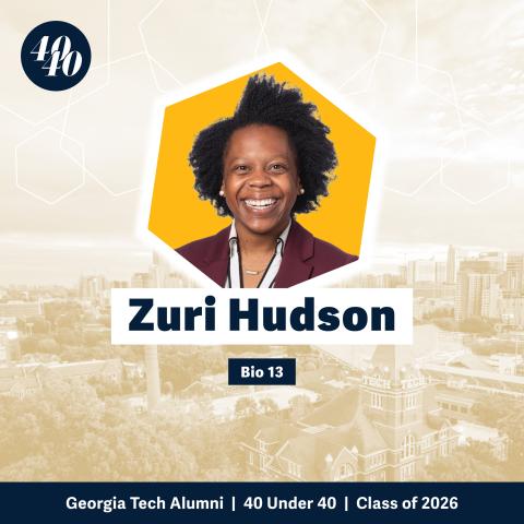 Headshot of Zuri Hudson with a faded background showing Georgia Tech's campus