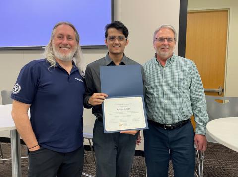 Aditya Singh, an undergraduate computer engineering student in the College of Engineering and CIC winner (middle).