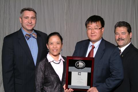 (L to R) G. Don Taylor, IIE President; Liping Luo, Prof. Shi’s wife; Prof. Jan Shi; and Roman M. Hlutkowsky, IIE Immediate Past President