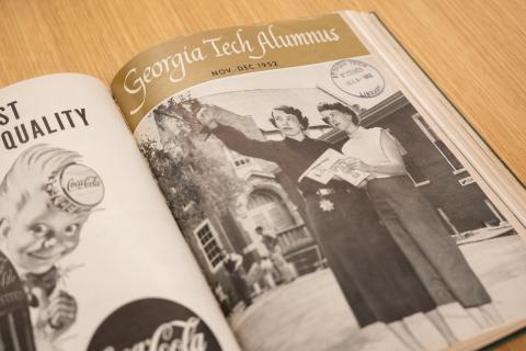 Image of alumni magazine with first women students. 