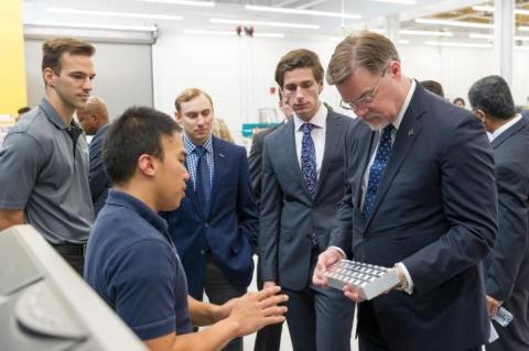 Toni Cvitanic (left) at Georgia Tech with Boeing executives