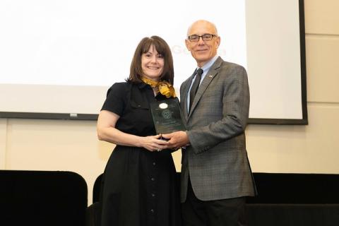 A photo of Karen Head receiving Class of 1934 Outstanding Service Award