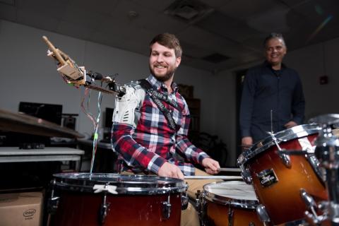 Music Technology proves that three arms are better than two with a cybernetic drumming arm.