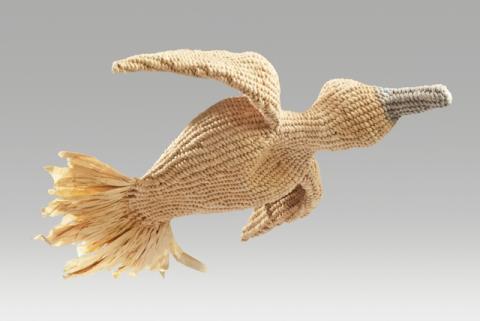   Flying duck made of paper thread
