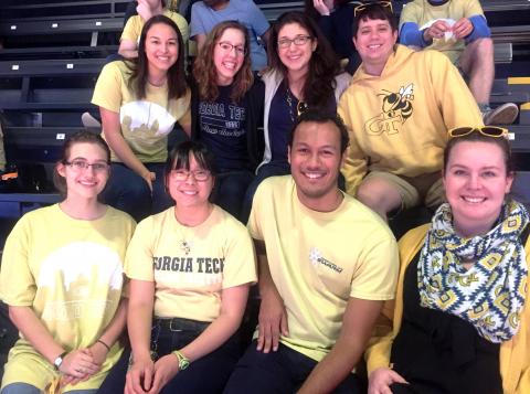Members of the Ivan Allen College Affinity Group attend a Georgia Tech men's basketball game.