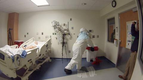 Researchers observe simulations in one of the four state-designated Ebola treatment centers in Georgia.