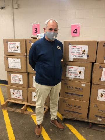 President Cabrera with donated PPE