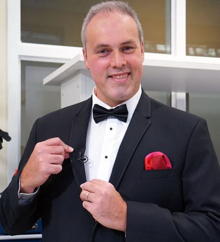 Omer Inan poses with the Countryman B3 lavalier microphone.