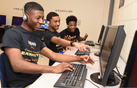 Students at a computer.