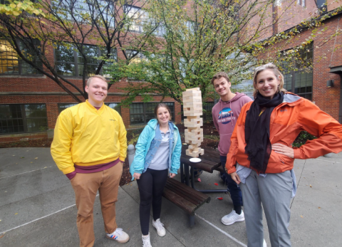 Students and School Chair Laura Taylor at the SOE Alumni Homecoming Tailgate