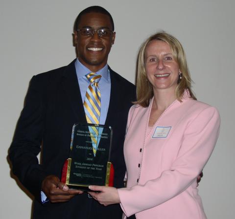 Emmanuel Miller, 2010 Work Abroad Student of the Year,  with Debbie Gulick, director of Work Abroad Programs and interim executive director, Division of Professional Practice