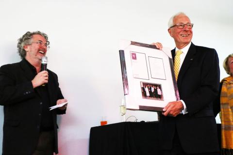 Jim Foley receives a gift at his reception