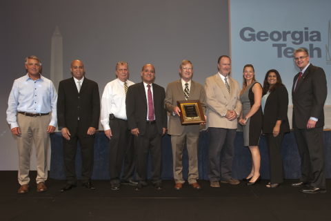 Members of Facilities Management leadership accept the APPA Award for Excellence. 