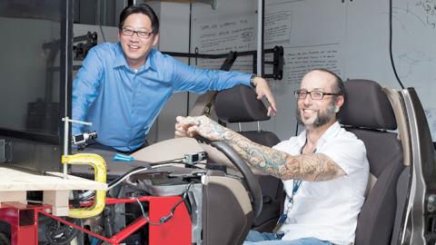 Wayne Li and Chris Bartlett conduct research on autonomous cars.
