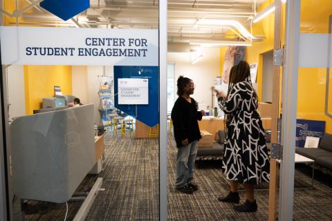 Jayde Nelson with a student at the Center for Student Engagement