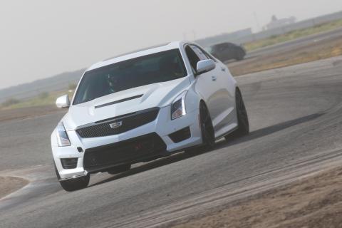 Joe Luck racing his Cadillac ATS-V at an amateur track day at Button Willow Raceway.