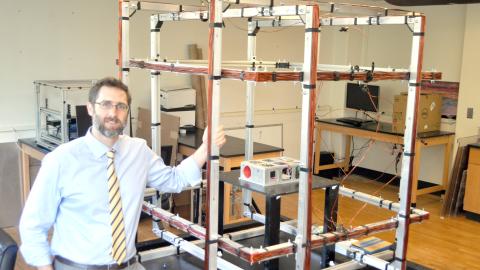Dr. Holzinger with Helmholtz cage