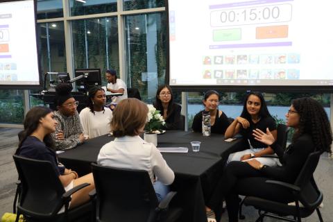 A group of students and mentors meet at the MentIEs kickoff dinner
