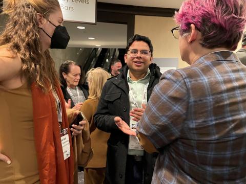 People chatting at a reception