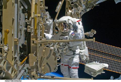 Shane Kimbrough, ISyE grad and current commander of the International Space Station, makes repairs to the ISS. (Photo credit: NASA)