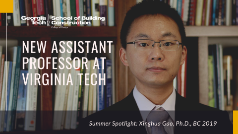 Xinghua Gao posing for camera in front of bookshelves. 